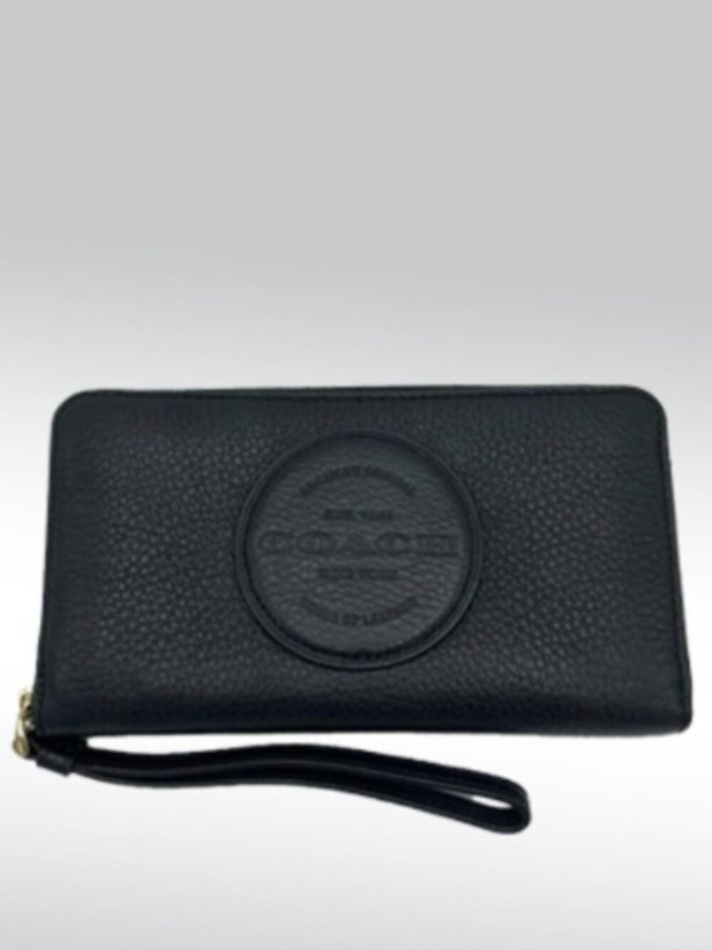 The Coach Leather Dempsey Large Phone Wallet
